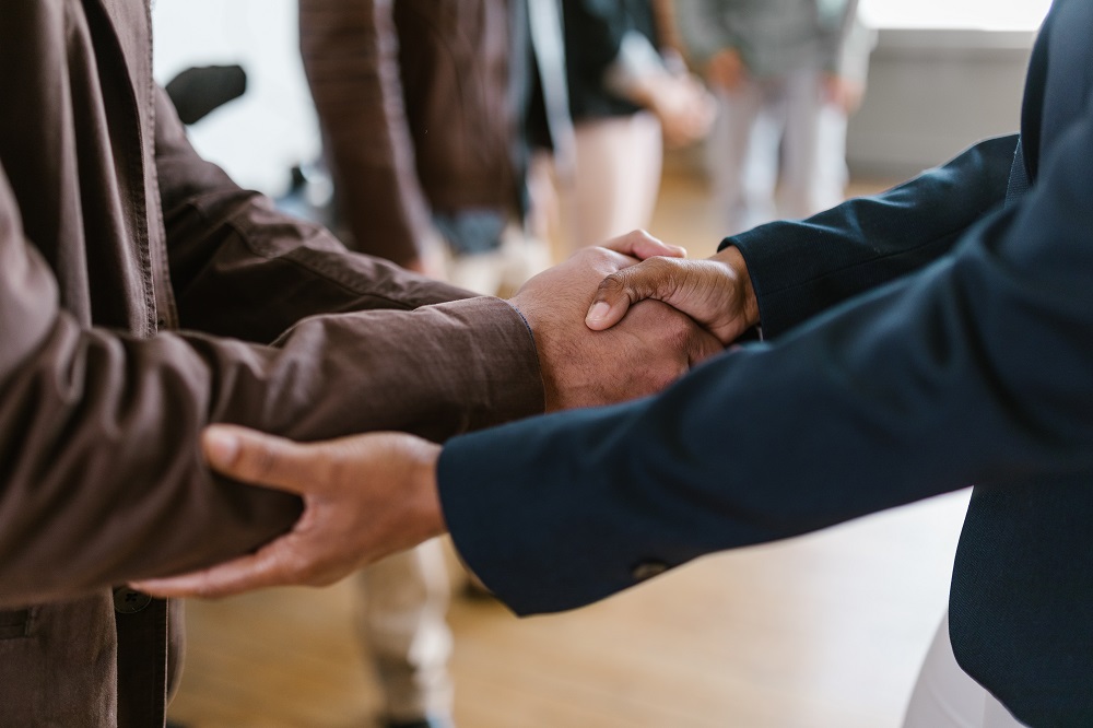 Close up. Reliable handshake of business people.